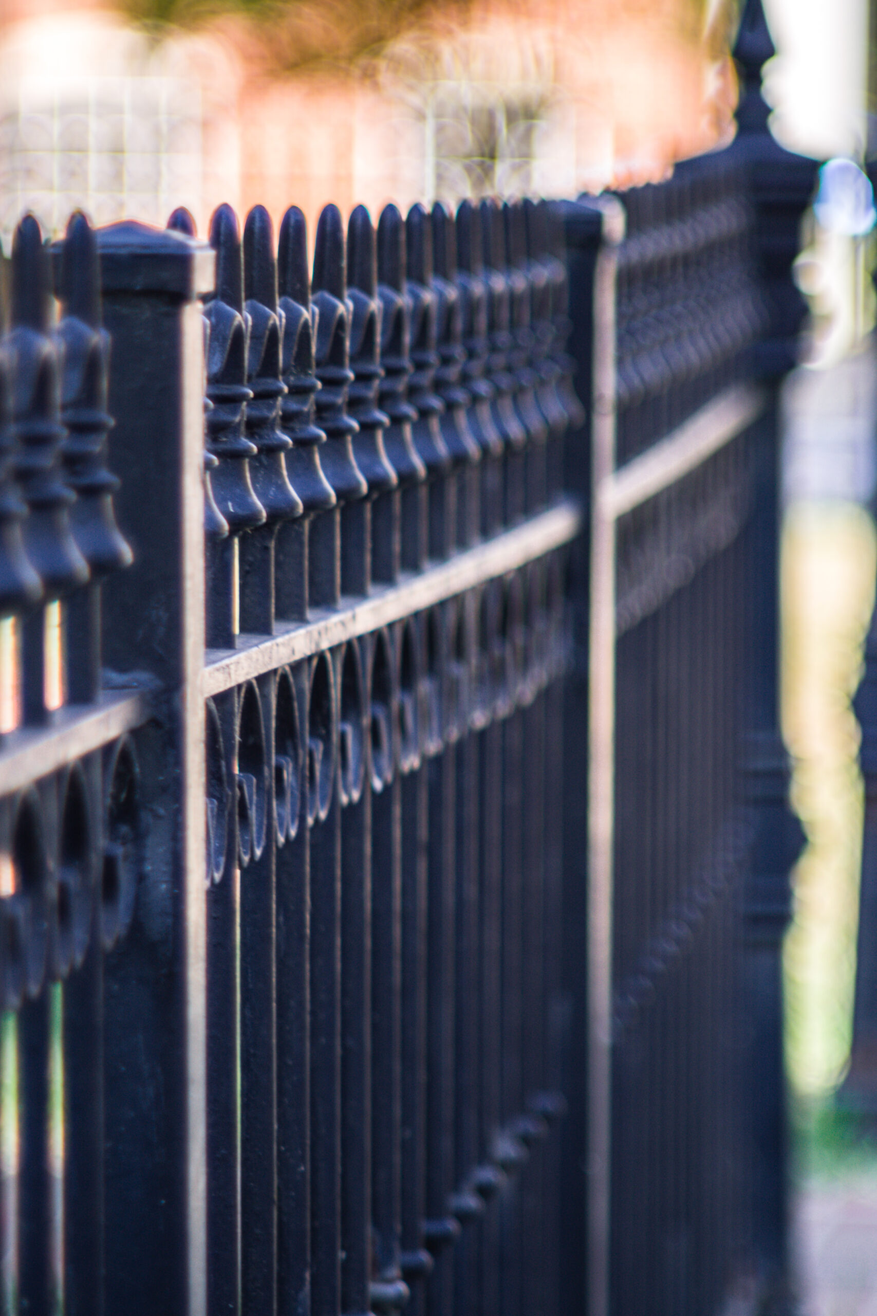 metal fence on a sidewalk